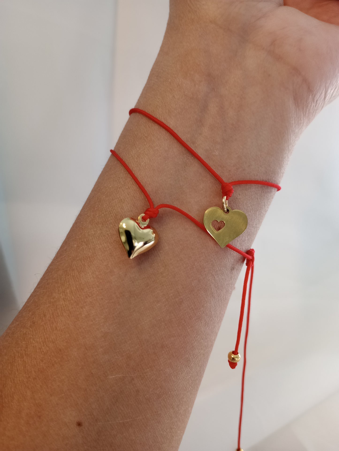Corazón hilo rojo